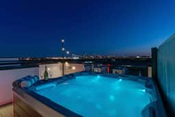Speakeasy-themed house • Hot tub • Sleeps 12 • 4BR - Image 2